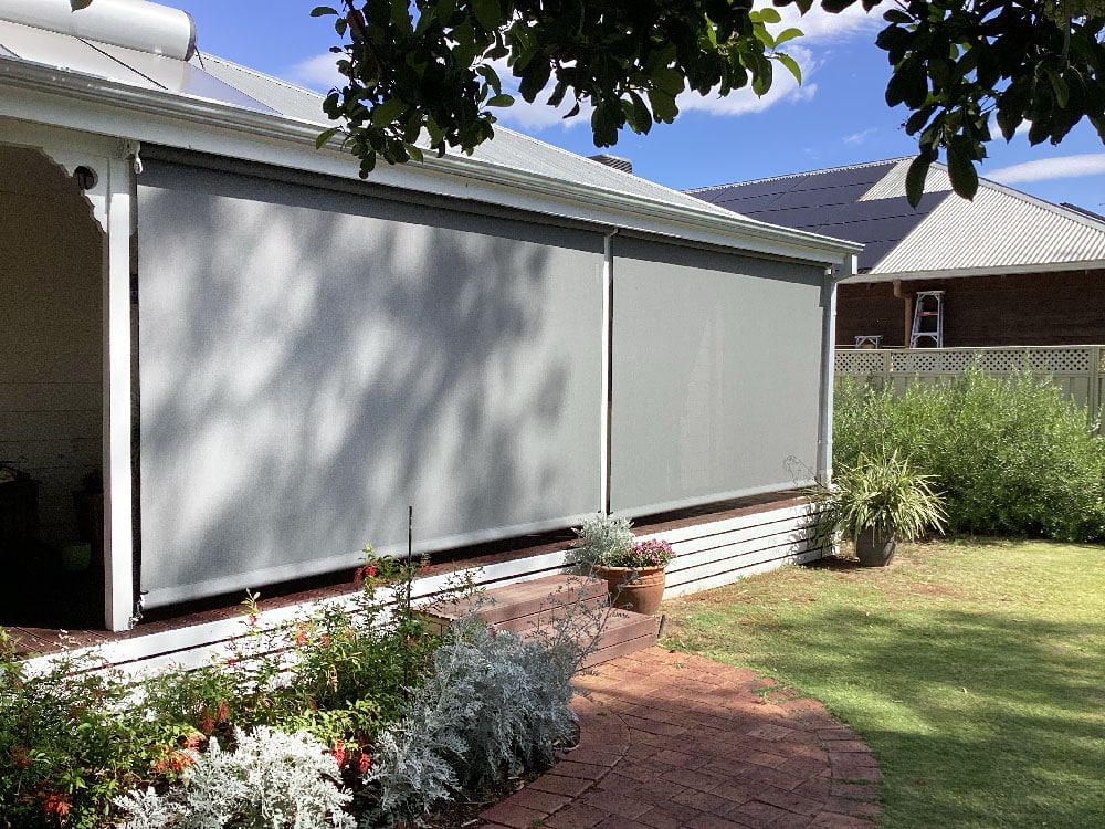 Crank handle outdoor blind with no tracks or posts