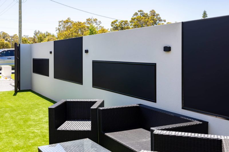 Fixed fabric screens providing permanent shade and privacy
