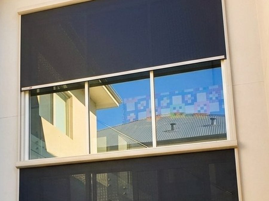Two NSS Lunar blinds on separate glazed sections above and below a highlight window