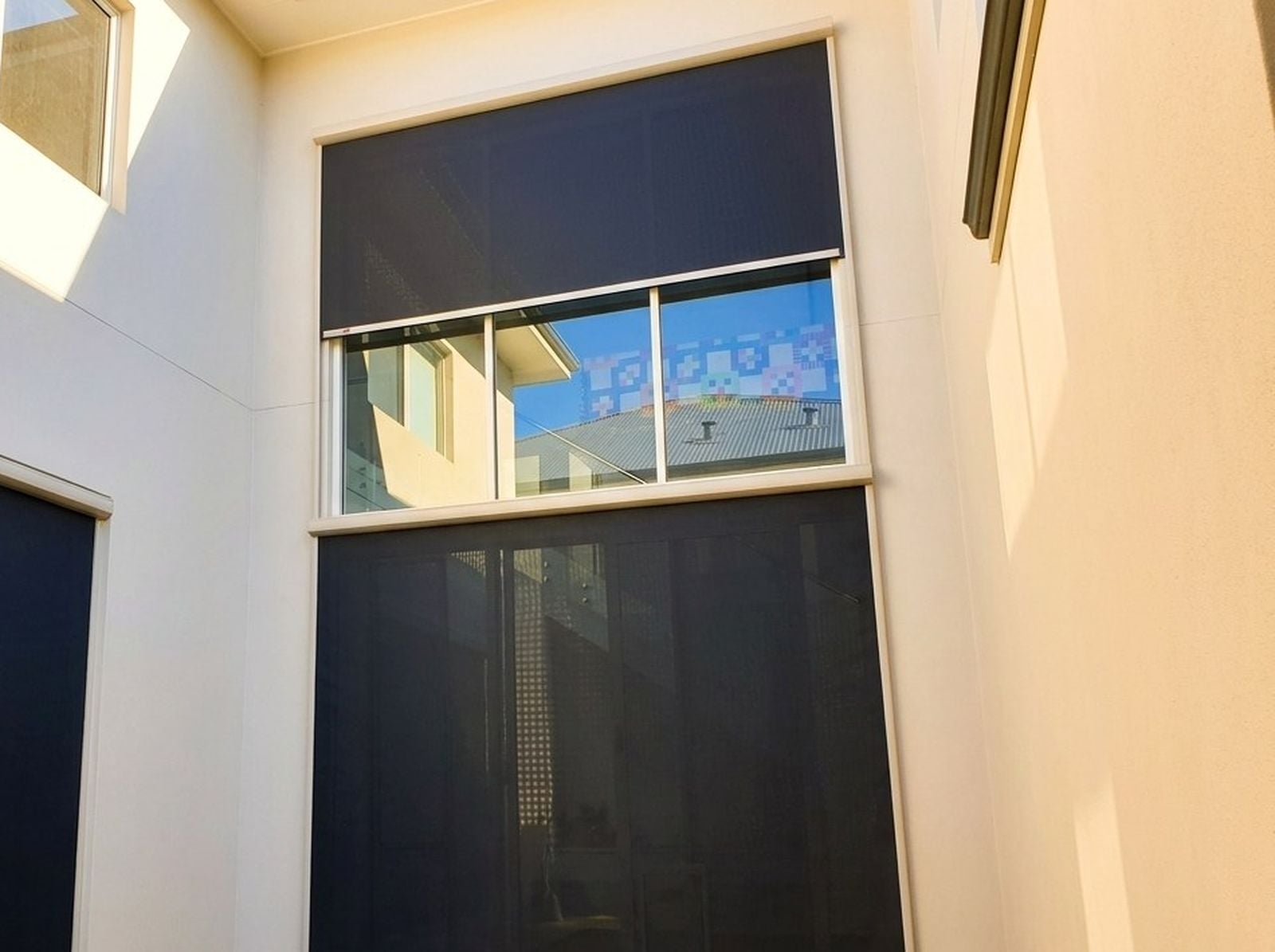 NSS Lunar outdoor window blinds on courtyard windows in a Perth home
